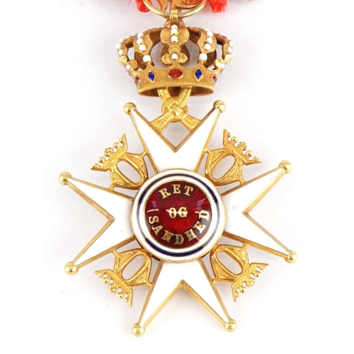  A Norwegian Military Division Order of Olav gold and enamel knights breast badge.