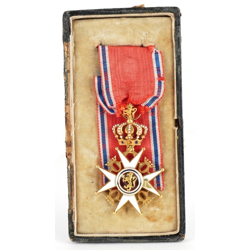  A Norwegian Military Division Order of Olav gold and enamel knights breast badge.