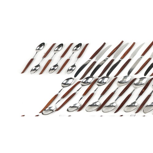 1218 - A large collection of Glosswood stainless steel Sheffield cutlery with wooden handles.