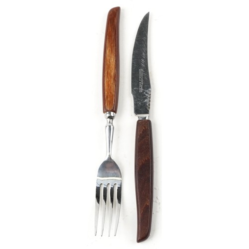 1218 - A large collection of Glosswood stainless steel Sheffield cutlery with wooden handles.