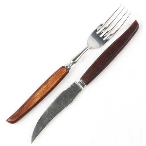 1218 - A large collection of Glosswood stainless steel Sheffield cutlery with wooden handles.