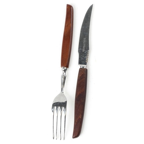 1218 - A large collection of Glosswood stainless steel Sheffield cutlery with wooden handles.