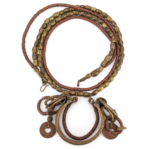 1222 - A mid 20th century African metal bead necklace, circa 1940, drop 35cm.