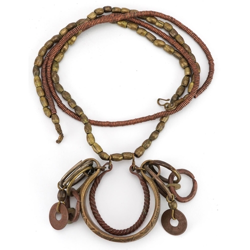 1222 - A mid 20th century African metal bead necklace, circa 1940, drop 35cm.