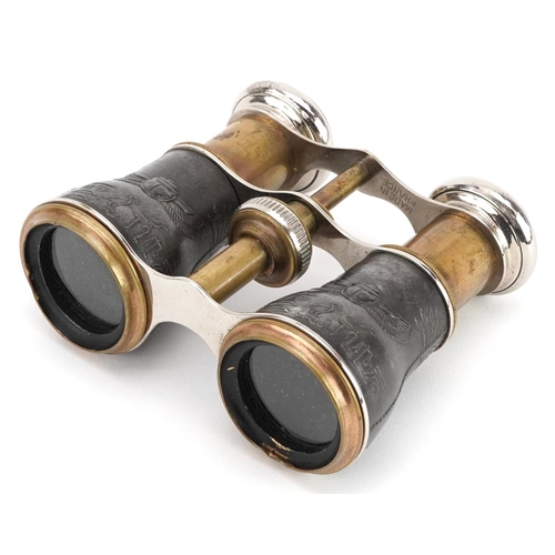 1260 - A pair of early 20th century French Egyptianesque brass and chromium plated opera glasses, 10cm wide... 