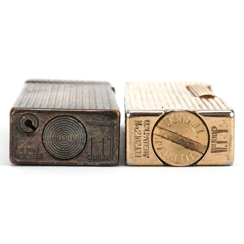 293 - Two Dunhill engine turned pocket lighters, each 6.5cm high.