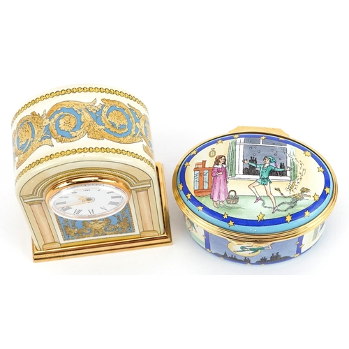 402 - A Halcyon Days enamelled Peter Pan trinket box and a Buckingham Palace enamelled clock, each with fi... 