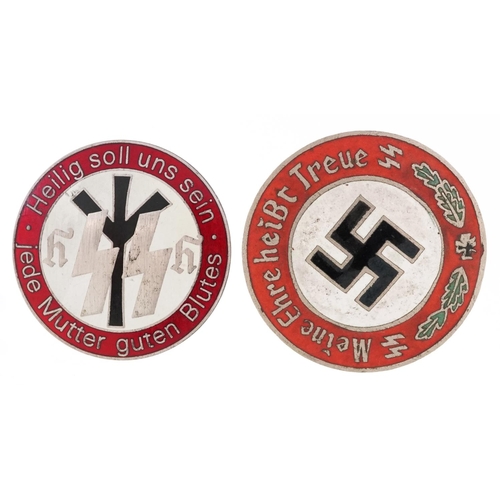 757 - Two German military interest enamel Swastika and SS badges, the largest 4cm in diameter.