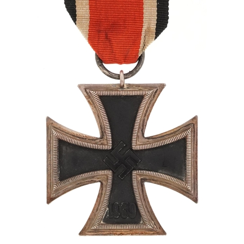 756 - A German military interest Iron Cross with ribbon.