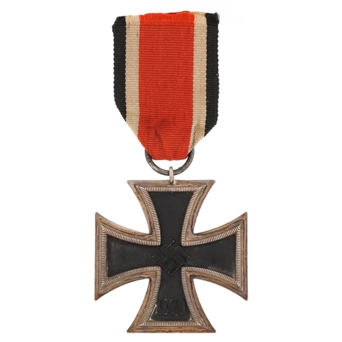 756 - A German military interest Iron Cross with ribbon.