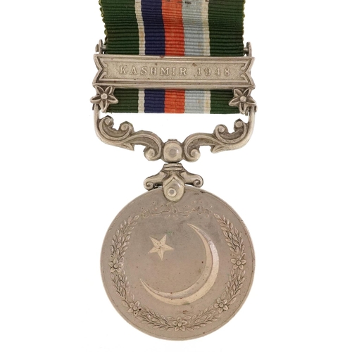 769 - A military interest Pakistan medal with Kashmir 1948 bar.