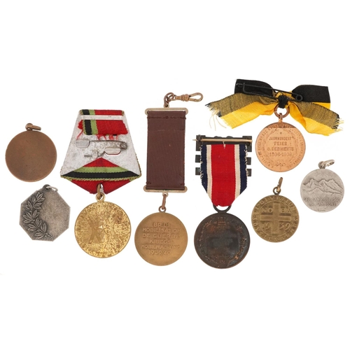 755 - Eight military interest medallions including French Rally Cyclist's Military, Field Marshal Lord Rob... 