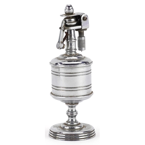 1197 - A vintage chromed metal Anglia British made table lighter numbered A5/1531, 10.5cm high.