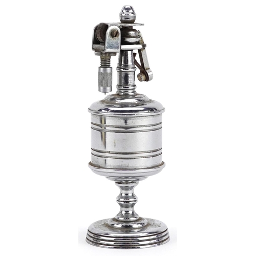 1197 - A vintage chromed metal Anglia British made table lighter numbered A5/1531, 10.5cm high.