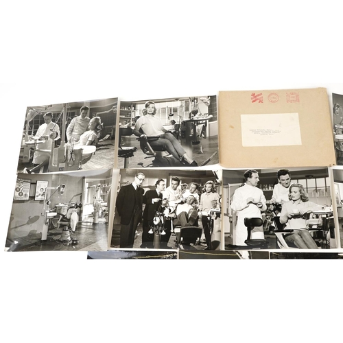  A collection of black and white Carry on Dentist set photographs including Bob Monkhouse, Ronnie Ste... 