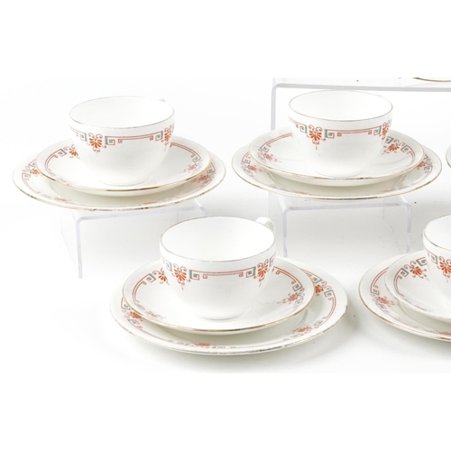 438 - A set of seven Shelley Art Deco trios and bread plate, pattern number 8428, the largest 22.5cm in di... 