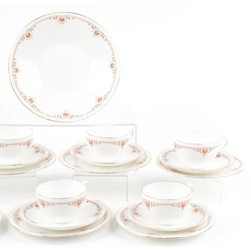 438 - A set of seven Shelley Art Deco trios and bread plate, pattern number 8428, the largest 22.5cm in di... 