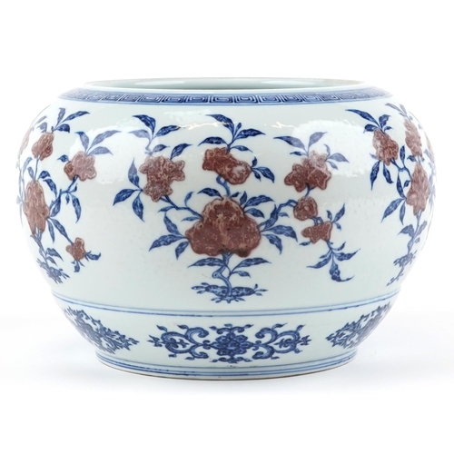 176 - A Chinese porcelain jardinière, 20th century, with hand painted in iron red and blue flowers, charac... 