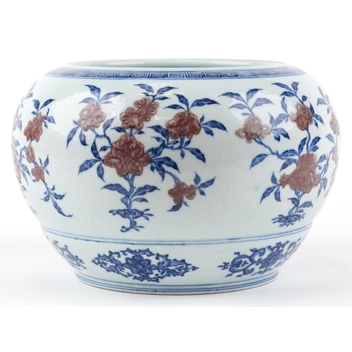 176 - A Chinese porcelain jardinière, 20th century, with hand painted in iron red and blue flowers, charac... 