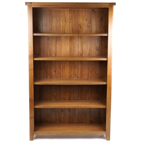 1011 - A large modern oak five tier open bookcase, 211cm H x 131cm W x 36cm D