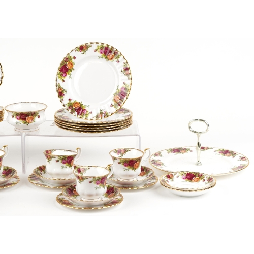 449 - A Royal Albert Old Country Roses six place tea service including trios and cake stand, the largest 2... 