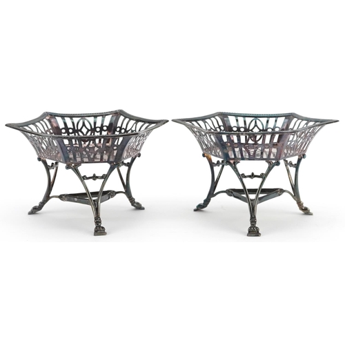 644 - H C Freeman & Co, a pair of Edwardian hexagonal pierced silver bonbon dishes raised on three feet, L... 