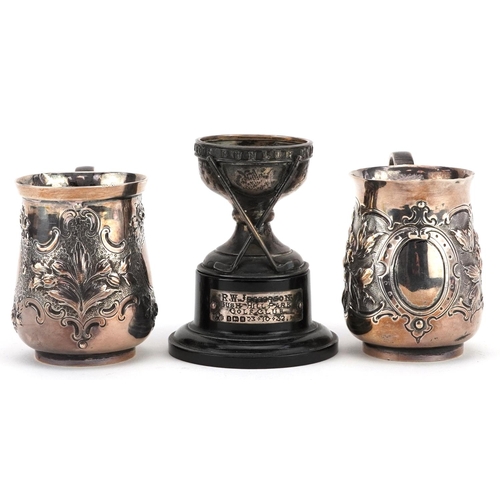 666 - Victorian and later silver comprising two christening tankards embossed with flowers and foliage and... 