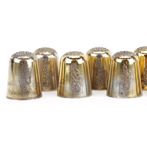 671 - Thomas Kerr Ebbutt, a set of ten Scottish silver thimbles, each engraved with The Queen's Beasts, Ed... 