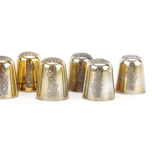 671 - Thomas Kerr Ebbutt, a set of ten Scottish silver thimbles, each engraved with The Queen's Beasts, Ed... 