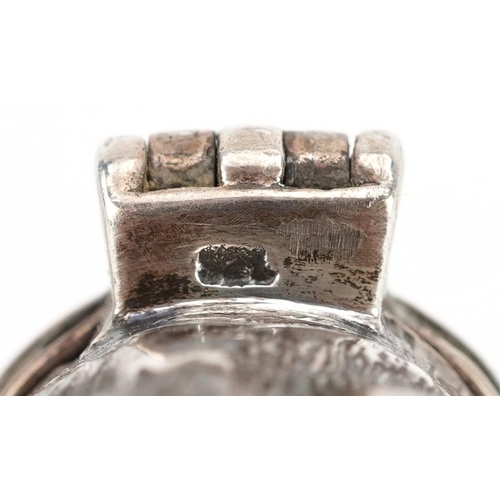 694 - A Victorian novelty silver pill box, with hinged lid in the form of a dog's head, 3.2cm in length, 2... 