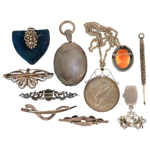 624 - A group of antique and later silver jewellery including a large Victorian style locket, 1922 Liberty... 