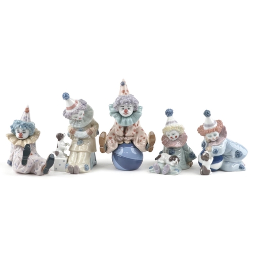 773 - Five Lladro figures of clowns - Pierrot with Puppy, Tired Friend, Pierrot with Concertina numbered 5... 