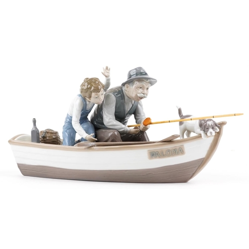 720 - A large Lladro figure group of a gentleman and a young boy fishing on a boat - Fishing with Gramps, ... 