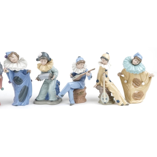 779 - Eight Nao porcelain figures including Harlequin boy with puppy and Harlequin musician boy, the large... 