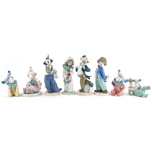 778 - Eight Nao porcelain figures including Airy Clown, the box numbered 00488, Clown with Ball, the box n... 