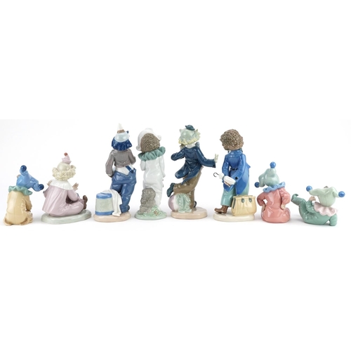 778 - Eight Nao porcelain figures including Airy Clown, the box numbered 00488, Clown with Ball, the box n... 