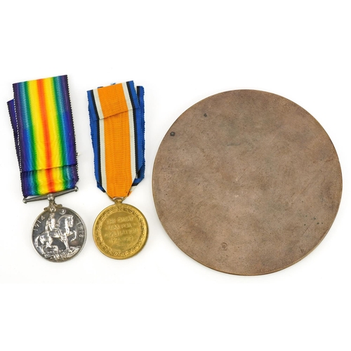 653 - The Black Watch interest World War I medal pair and death plaque with paperwork awarded to 6216 PTE.... 