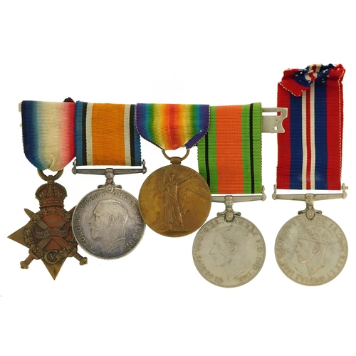 655 - A British military World War I medal trio and two World War II medals, the World War I group awarded... 