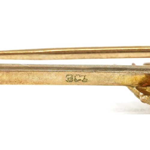 697 - A military interest 9ct gold Merchant Navy sweetheart bar brooch, 5cm wide, 2.9g.