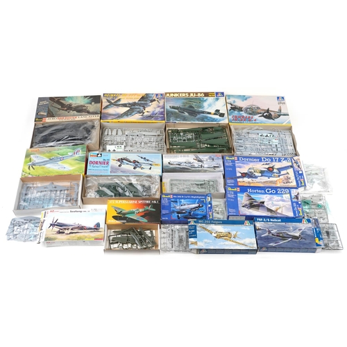 573 - A collection of model aeroplane kits with boxes including Italeri, Revell, Monogram and X Trakit.