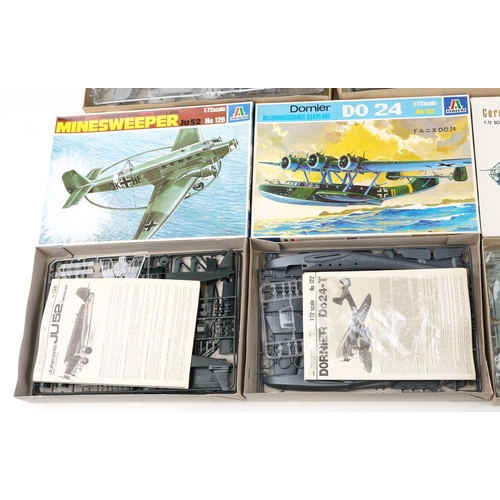 570 - A collection of model aeroplane kits including Revell, Hasegawa and Italaerei.