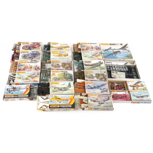 555 - A collection of Matchbox model kits including L.R.D.G. 30cwt Chevrolet Willy's Jeep, Beaufighter MK-... 