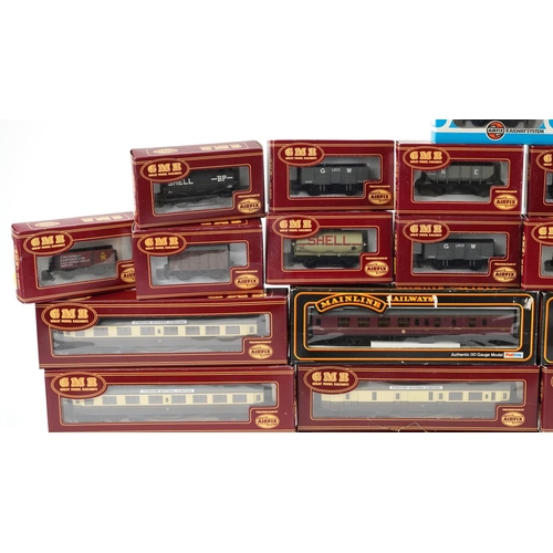 514 - A collection of Airfix and Palitoy die cast model railway coach sets and wagons.