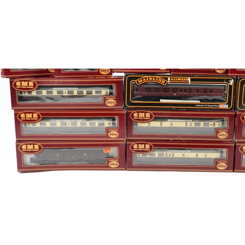 514 - A collection of Airfix and Palitoy die cast model railway coach sets and wagons.