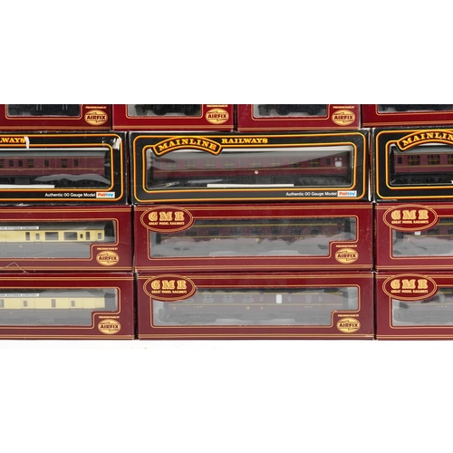 514 - A collection of Airfix and Palitoy die cast model railway coach sets and wagons.