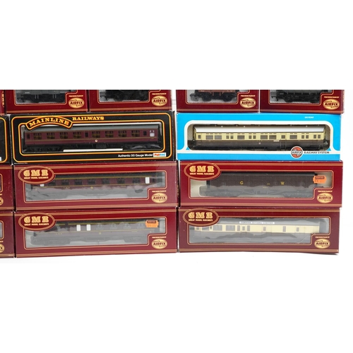 514 - A collection of Airfix and Palitoy die cast model railway coach sets and wagons.