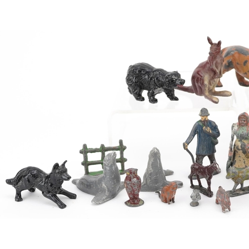 526 - A small group of early 20th century hand painted lead and metal farmyard and animal toy figures, pos... 