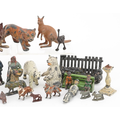 526 - A small group of early 20th century hand painted lead and metal farmyard and animal toy figures, pos... 