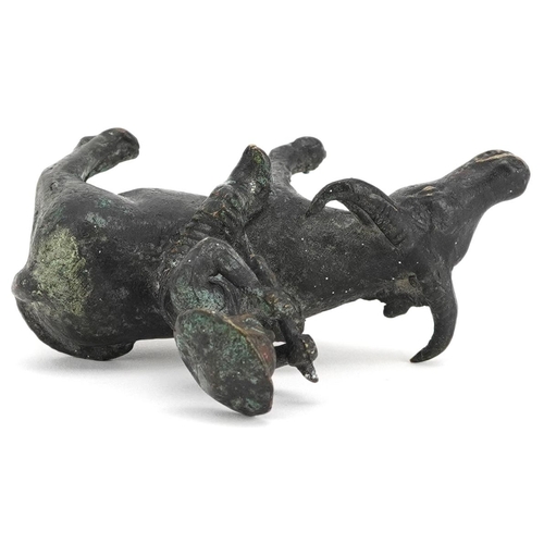 147 - A Chinese bronze figure group of man on the back of a water buffalo, 20th century, 10cm high.