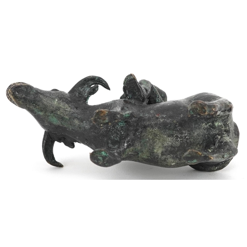 147 - A Chinese bronze figure group of man on the back of a water buffalo, 20th century, 10cm high.